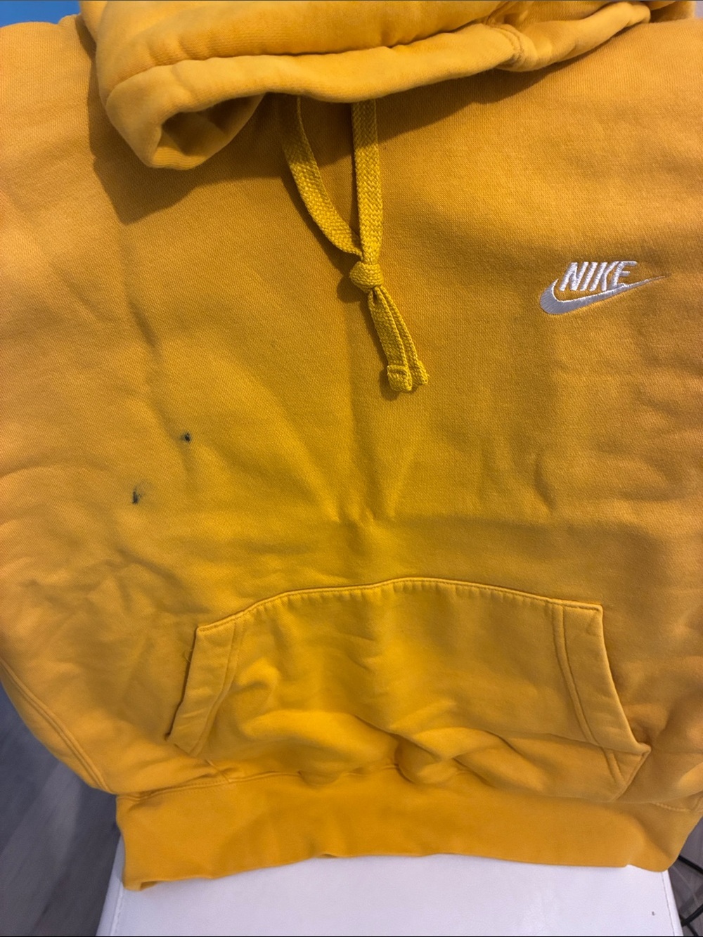 Nike Yellow Hoodie with Blue Swoosh Accent worn once got two ink spots on it.